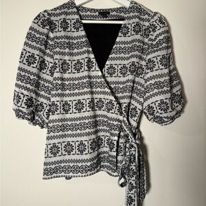 Ann Taylor black and white wrap blouse with a beautiful puff sleeve.